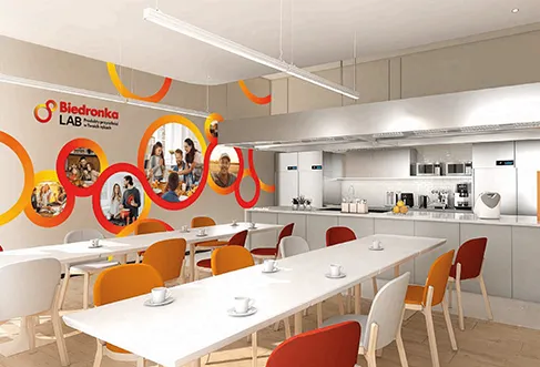 A modern kitchen with tables and chairs at Biedronka lab (photo)